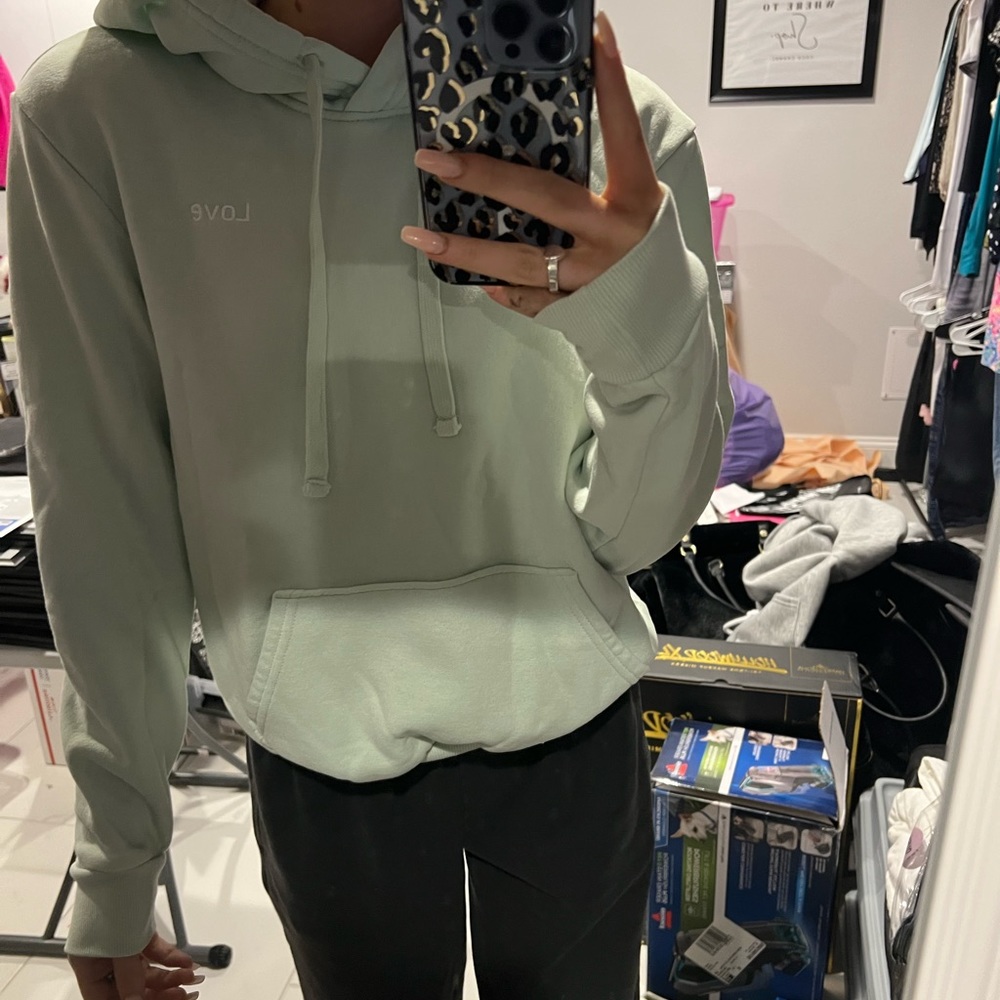 Barely worn in great shape. light mint green, the word LOVE in the top corner.